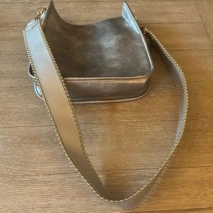 Ah-dorned crossbody bag